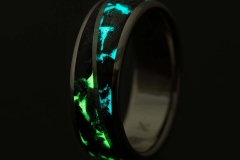 handmade wedding ring with dinosaur fossil and meteorite inlay and glow in dark ring option