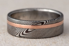 handmade mens or womens damascus steel and rose gold wedding ring