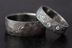 mens and womens obsidian shape wedding ring, made from damascus steel and white diamnds